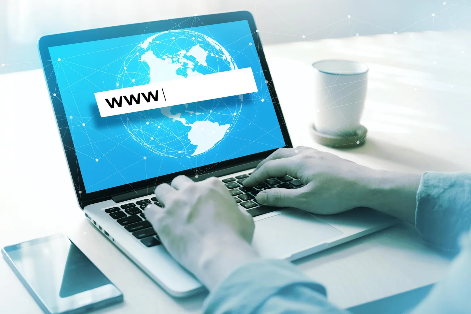 a person typing on a laptop